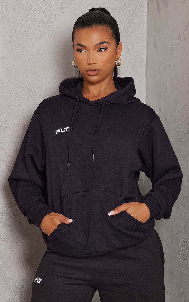 PRETTYLITTLETHING Logo Black Badge Detail Oversized Hoodie