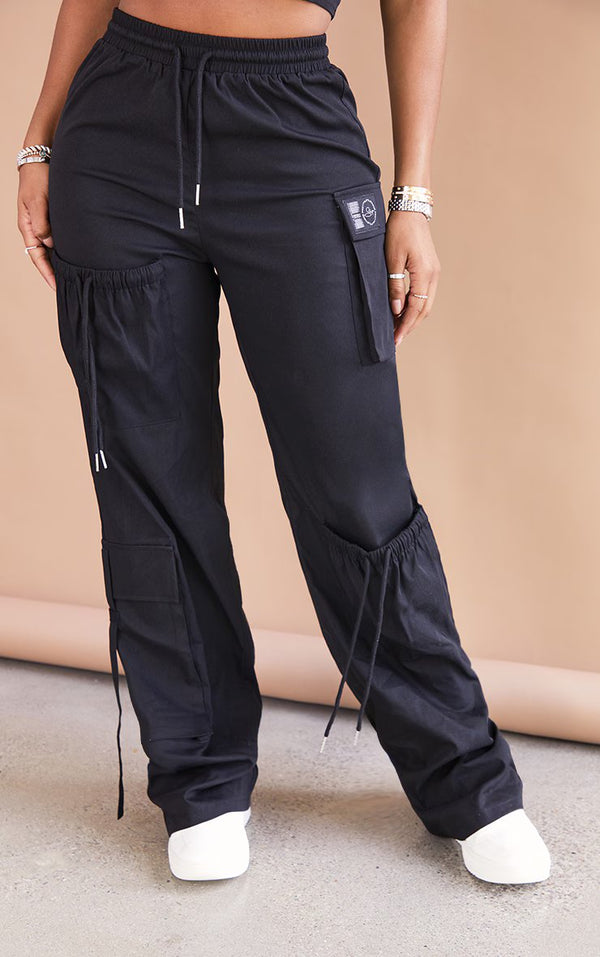 PRETTYLITTLETHING Shape Black Cargo Pocket Detail Wide Leg Joggers